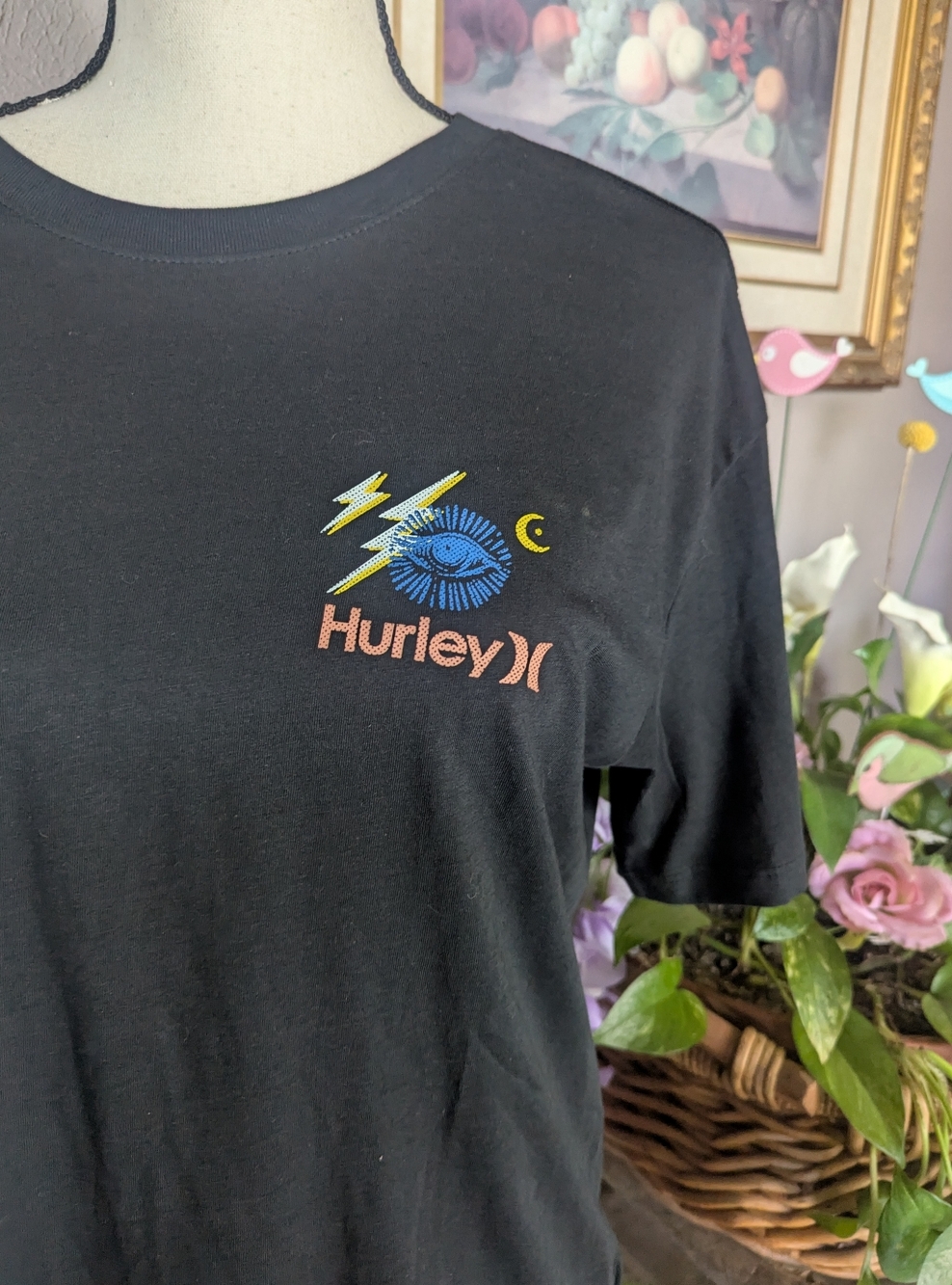 BNWOT Hurley Black Tee with Blue Eye and Yellow Lightning.